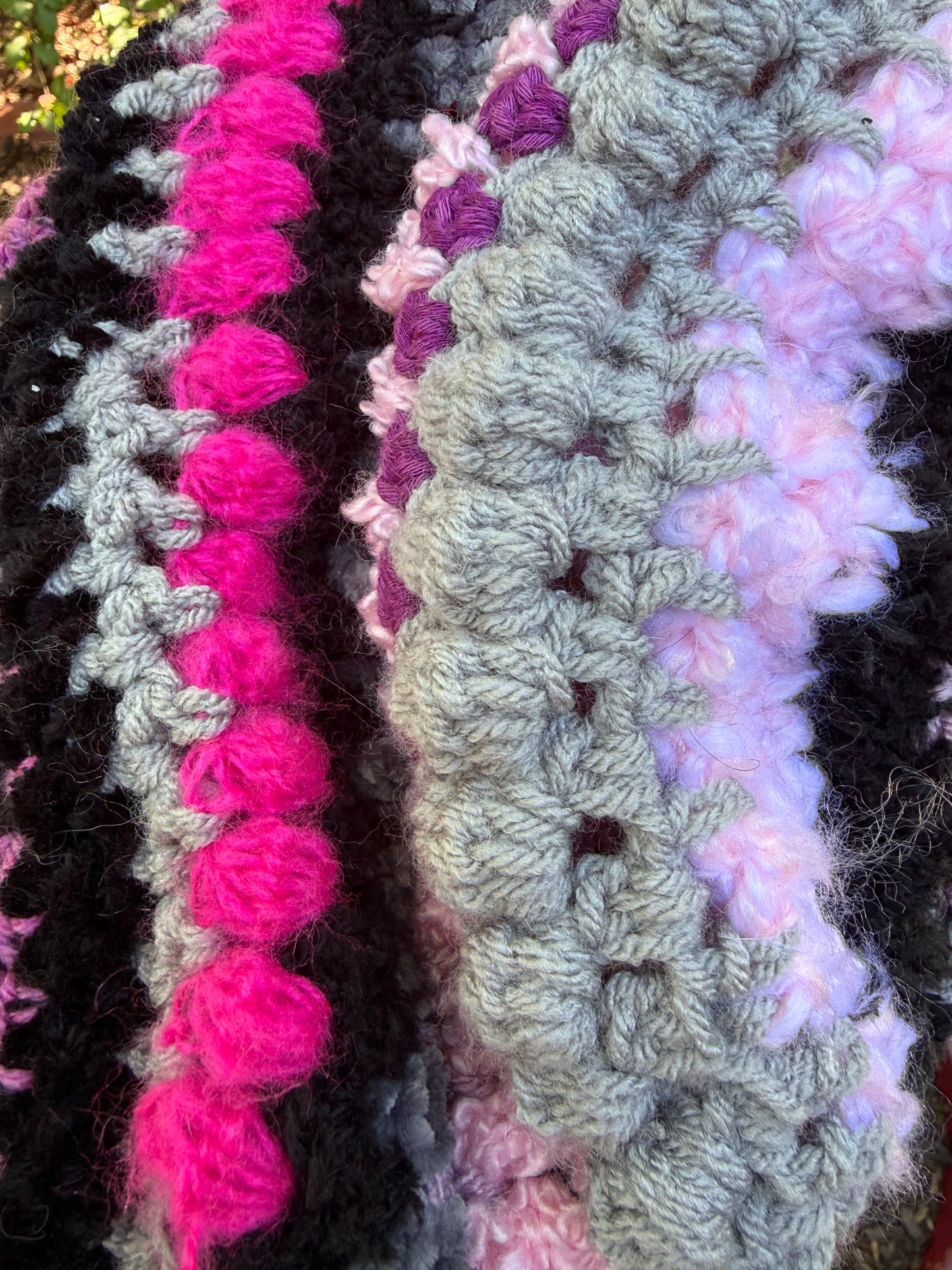 Close-up of Love Spell No. 01 crochet texture in hot pink, lavender, grey and black