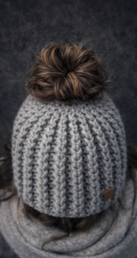 Silver Passage light gray ribbed open-tail crochet beanie shown upright highlighting structured winter silhouette